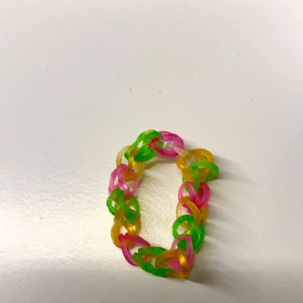 Brown\light gold color with green and pink size small rubber band bracelet